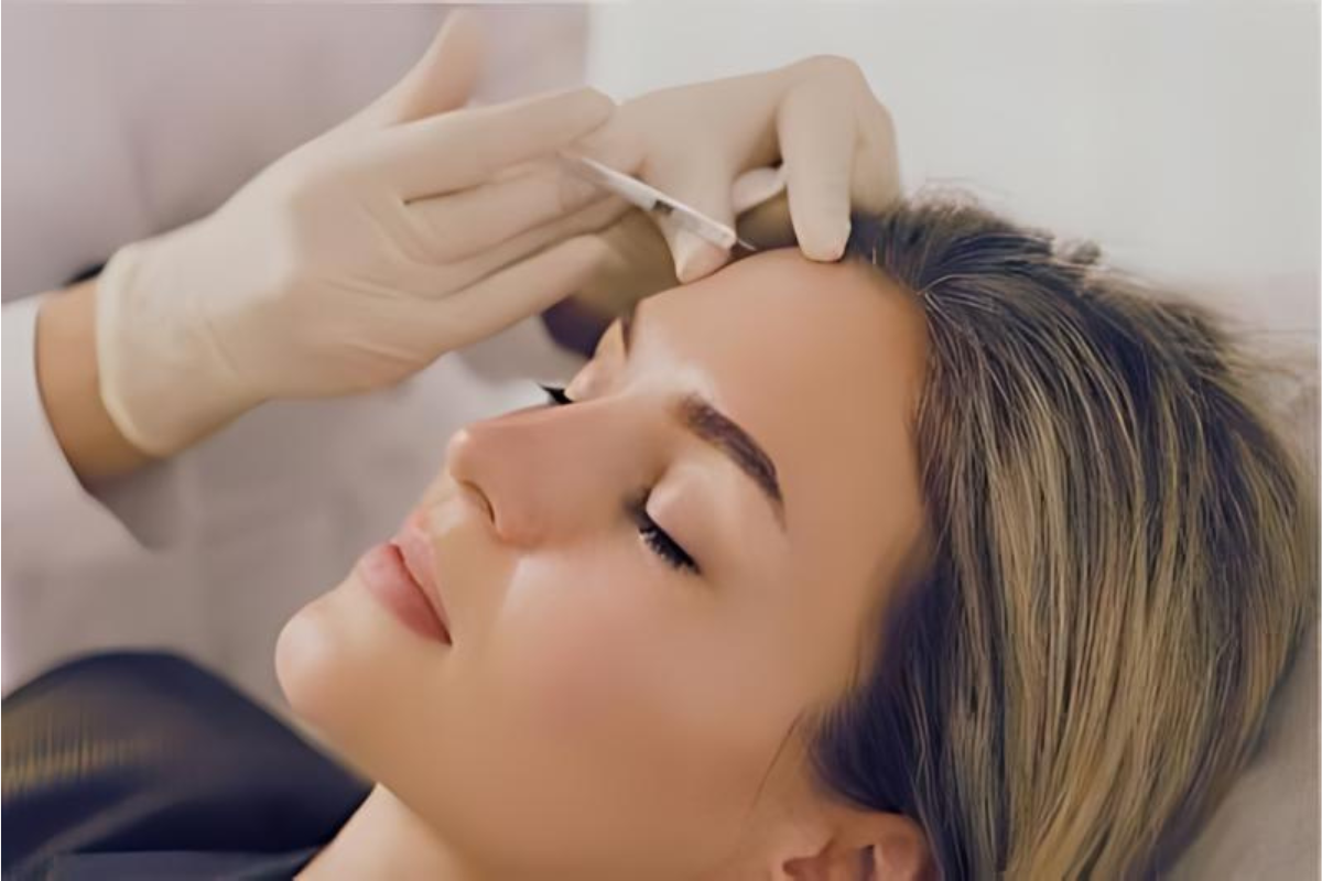 Aesthetic practitioner performing a polynucleotides treatment on a client's face. The image shows the application process aimed at enhancing skin regeneration, hydration, and elasticity, resulting in a more youthful and radiant complexion.